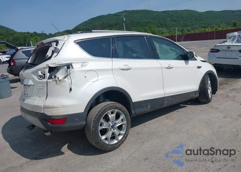 2014 Ford Escape Titanium from USA, damaged, VIN 1FMCU0JX4EUB94010